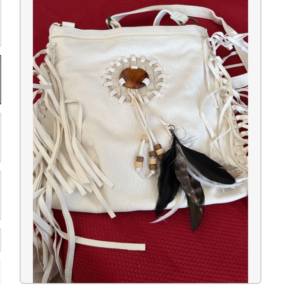 Carlos purse. White leather fringe with feather tassels.